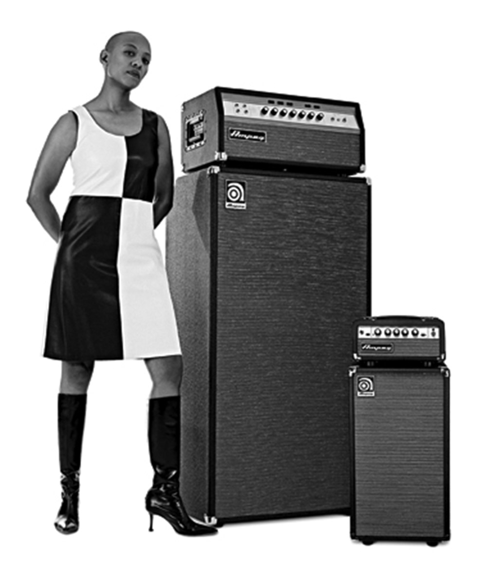 Gail Ann Dorsey standing next to a SVT stack and a Micro stack