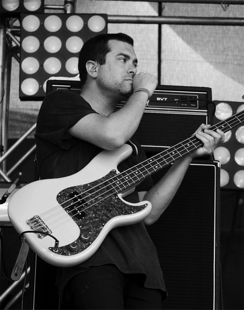 Tyler Carroll holding a bass