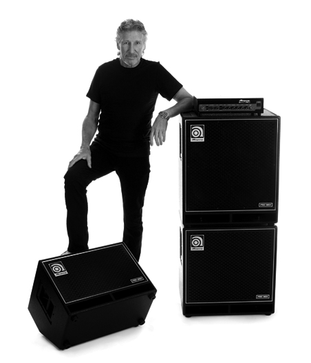 Roger waters leaning on an Ampeg stack and foot on a cab