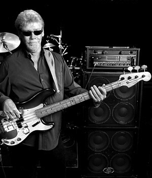 Donald Dunn playing bass on stage