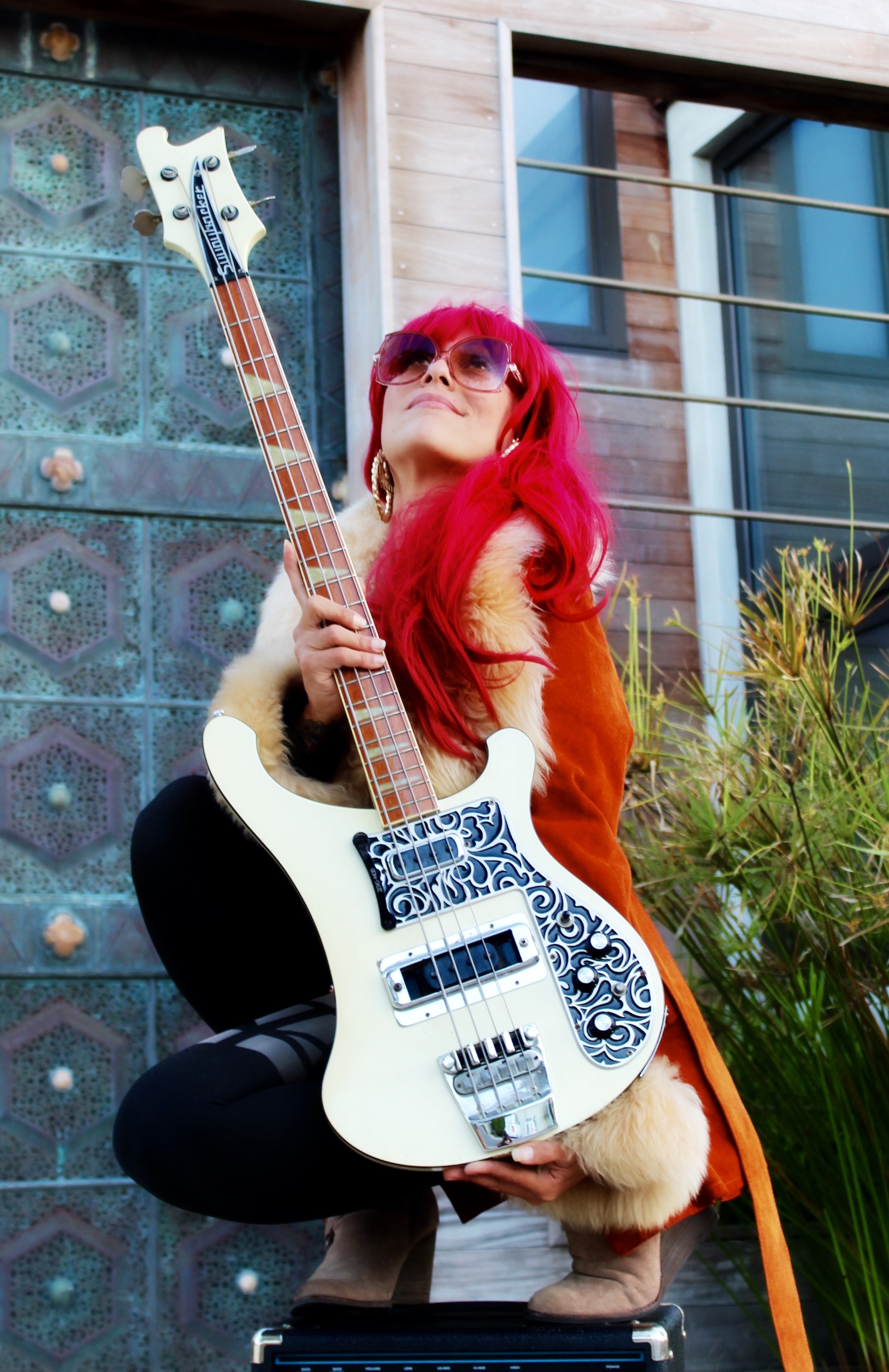 Sunshine Cantu holding a bass