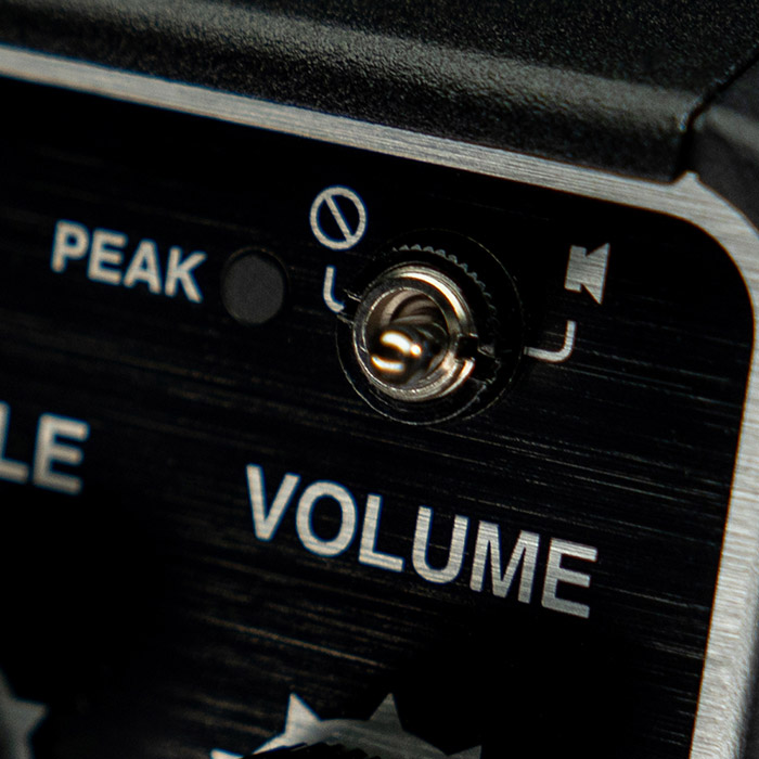 Close-up of compressor knob on Venture bass amp 