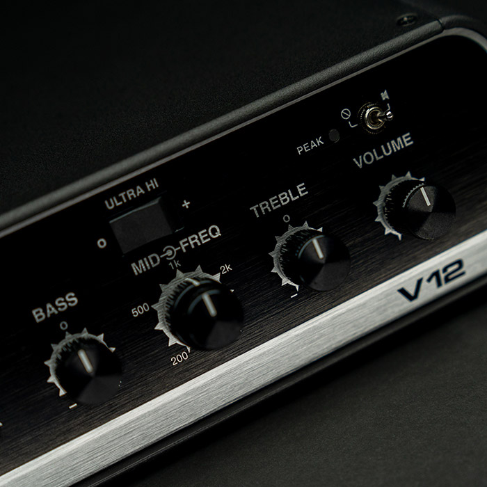 Close-up of V12 front: Ultra Hi switch, Bass, Midrange Freq/Level, Treble, Volume, Peak LED & Mute.